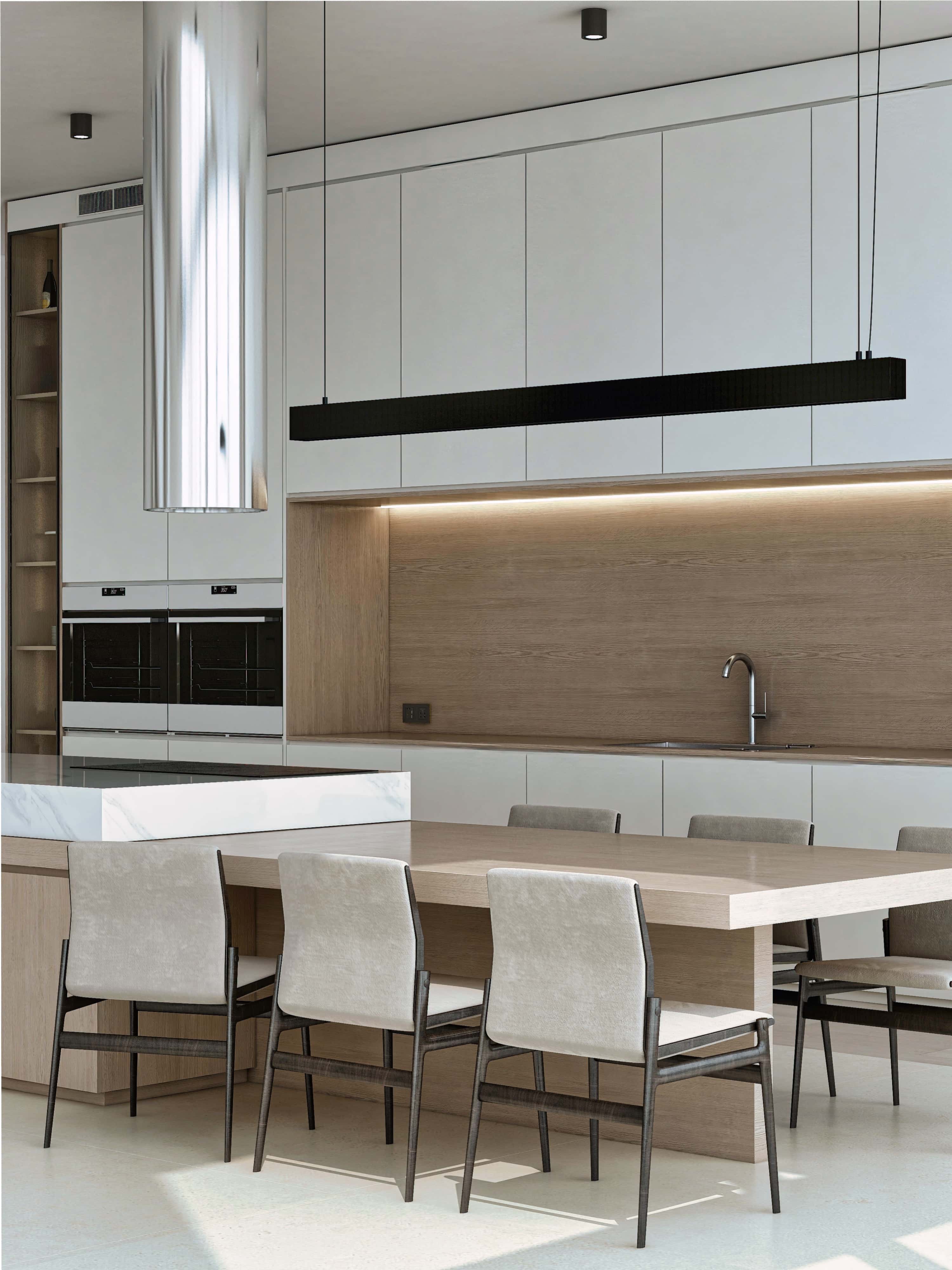 3D render of an oak dining table and upholstered chairs beneath a linear black pendant, white and oak kitchen beyond, New York City loft